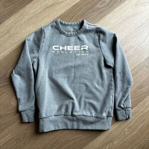 Rebel Athletic Cheer Athletics Kids' Gray Crewneck Sweatshirt CA logo